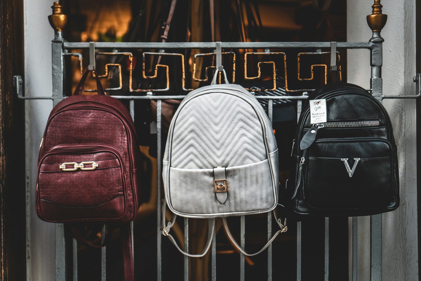 brown leather backpack on brown wooden table